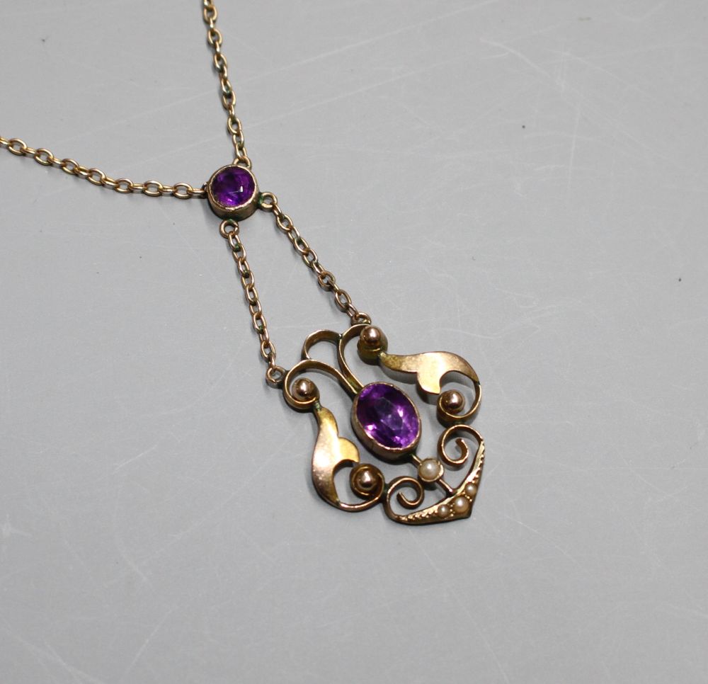 An Edwardian 9ct, amethyst and seed pearl set pendant necklace,